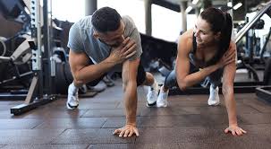 Toning Bingo Wings: Your Ultimate Guide to Sculpting Sleek Arms at the Gym 3 Fitness trainer demonstrating arm toning exercises Chippenham