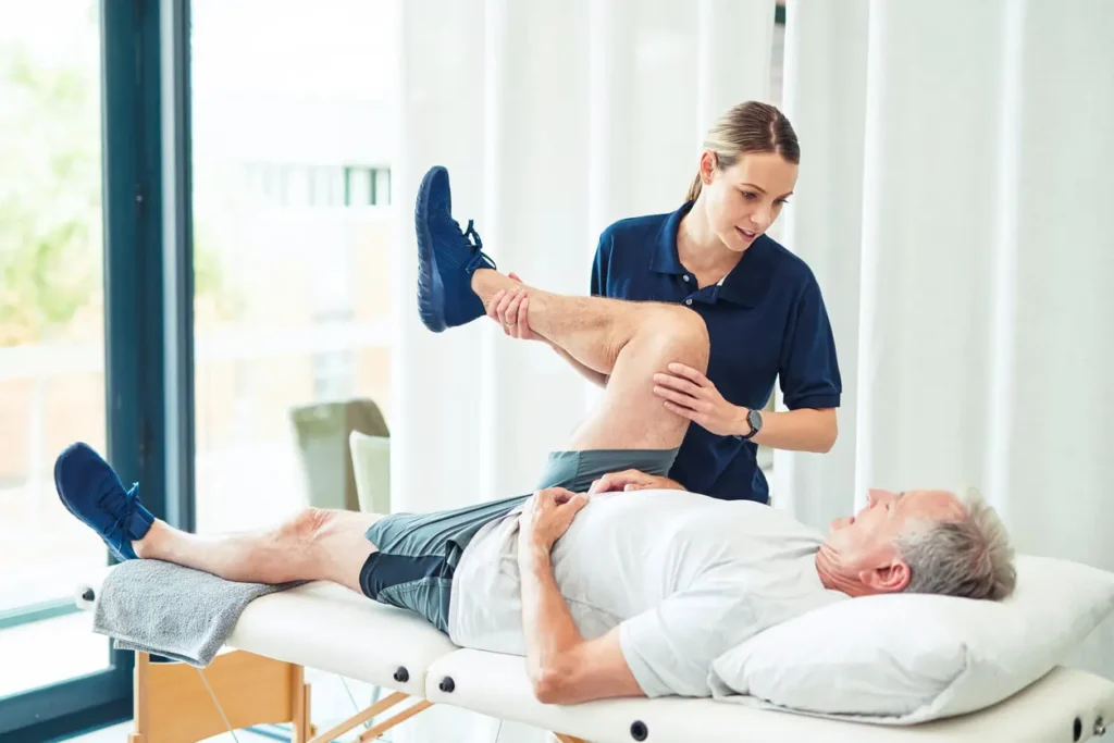 Revitalising Recovery: Effective Rehabilitation Strategies for Muscle Injuries 3 Physiotherapist assisting a patient with muscle recovery exercises Chippenham
