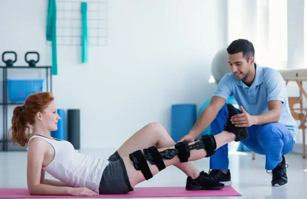 Woman having treatment to help muscle recovery Chippenham after an injury