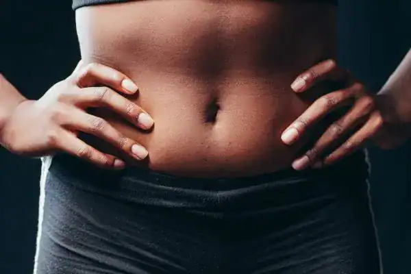 Toning Your Stomach: The Ultimate Guide to Achieving a Sculpted Stomach While Shedding Pounds 1 Image of a toned stomach after non surgical treatment Chippenham